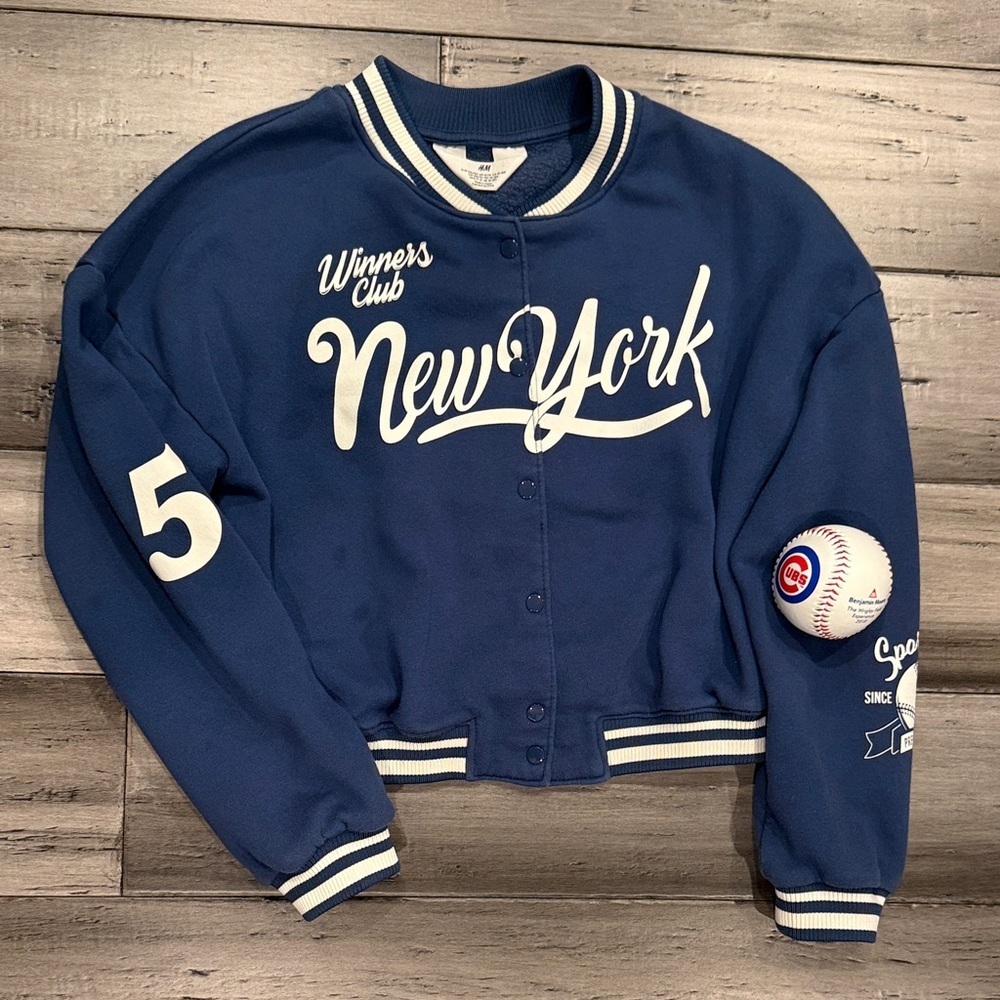 H&M Blue New York Varsity Jacket with White Lettering, includes the Cubs ball.